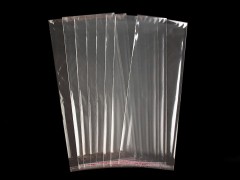 PP ragasztócsíkos celofán tasak  13x33  cm - 100 db Ajándék csomagolás